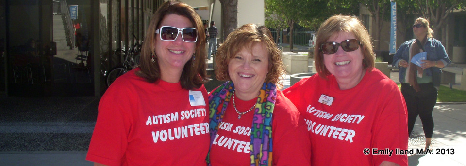Judy Mark, Caroline Wilson and Emily Iland in red Autism Society T-Shirts
